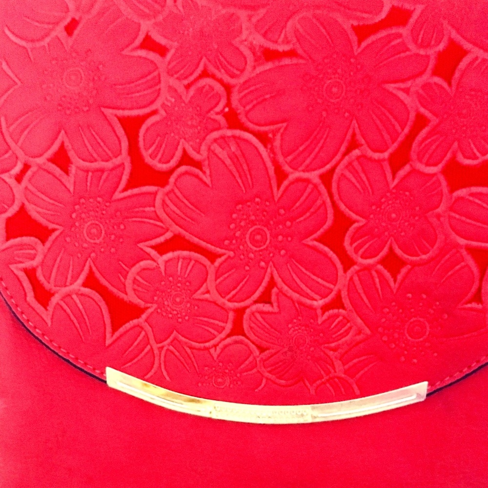 Red purse with flowers